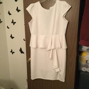 20w Peplum cream dress with ruffles